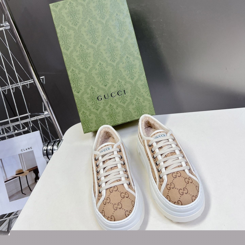 G*u*i sneakers
